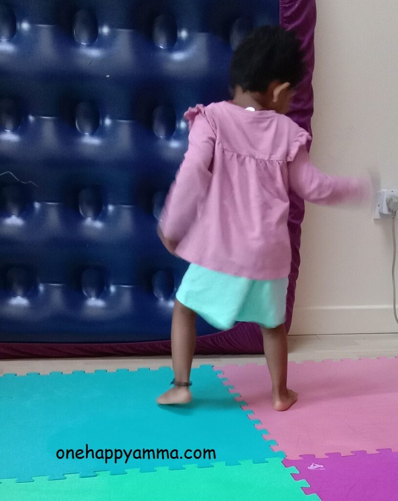 A toddler jumping on colored playmat  for 15+ Easy Fun Indoor Activities to do with Toddlers on One Happy Amma